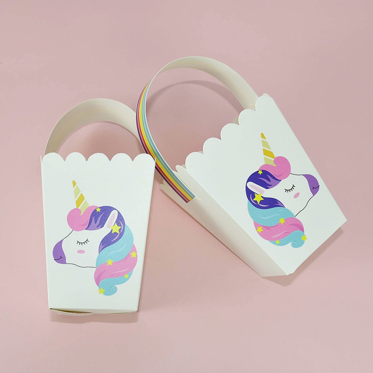 Set van 10 unicorn traktatiedoosjes in pastelkleuren, ideaal voor kinderverjaardagen en uitdeelmomenten.